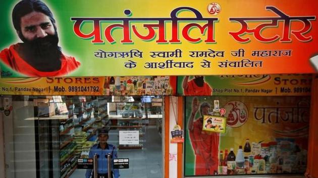 A private security guard stands inside a Patanjali store.(File)