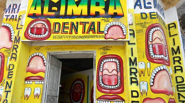 Somali dentist Hassan Ali, had the walls of his dental clinic decorated with Sidow’s murals in Hamarweyne district of Mogadishu, Somalia. (Feisal Omar / REUTERS) Somali dentist Hassan Ali, had the walls of his dental clinic decorated with Sidow’s murals in Hamarweyne district of Mogadishu, Somalia. (Feisal Omar / REUTERS)
