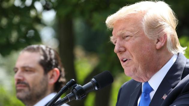 US President Donald Trump holds a news conference with Prime Minister of Lebanon Saad Hariri, in the Rose Garden at the White House on July 25. (AFP Photo) US President Donald Trump holds a news conference with Prime Minister of Lebanon Saad Hariri, in the Rose Garden at the White House on July 25. (AFP Photo)