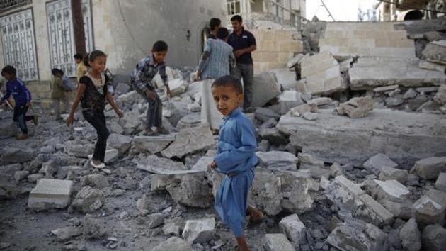 FILE -- In this Sept. 8, 2015 file photo, children play amid the rubble of a house destroyed by a Saudi-led airstrike in Sanaa, Yemen. Hunger has been the most horrific consequence of Yemen’s conflict and has spiraled since Saudi Arabia and its allies, backed by the U.S., launched a campaign of airstrikes and a naval blockade a year ago. (AP) FILE -- In this Sept. 8, 2015 file photo, children play amid the rubble of a house destroyed by a Saudi-led airstrike in Sanaa, Yemen. Hunger has been the most horrific consequence of Yemen’s conflict and has spiraled since Saudi Arabia and its allies, backed by the U.S., launched a campaign of airstrikes and a naval blockade a year ago. (AP)