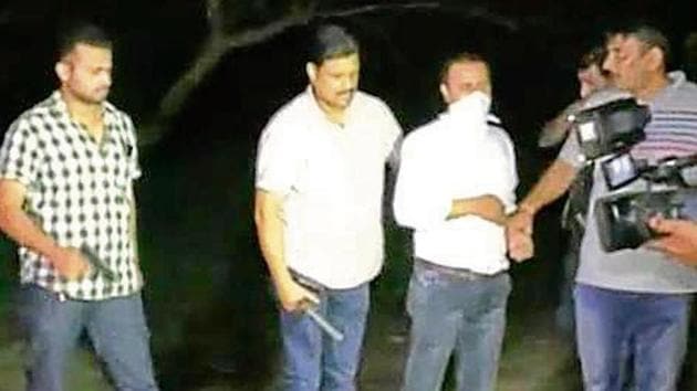 The video showed that in a dramatic chain of events, a team of Ghaziabad police flagging down a bike near Kamla Nehru Nagar, firing multiple shots in the air and nabbing one of the fleeing bikers after a 100 metre chase. (Video Grab) The video showed that in a dramatic chain of events, a team of Ghaziabad police flagging down a bike near Kamla Nehru Nagar, firing multiple shots in the air and nabbing one of the fleeing bikers after a 100 metre chase. (Video Grab)