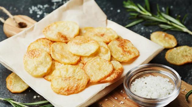 Baked potato chips are healthier than fried chips.(Shutterstock)