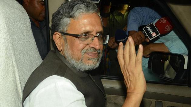 BJP leader Sushil Kumar Modi arrives at Nitish Kumar's residence in Patna on Wednesday. (PTI Photo) BJP leader Sushil Kumar Modi arrives at Nitish Kumar's residence in Patna on Wednesday. (PTI Photo)