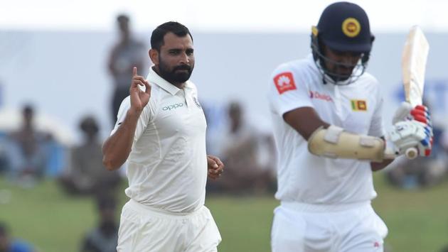 Mohammed Shami (L) then picked up two wickets in four deliveries to put a major dent in Sri Lanka’s innings. (AFP)