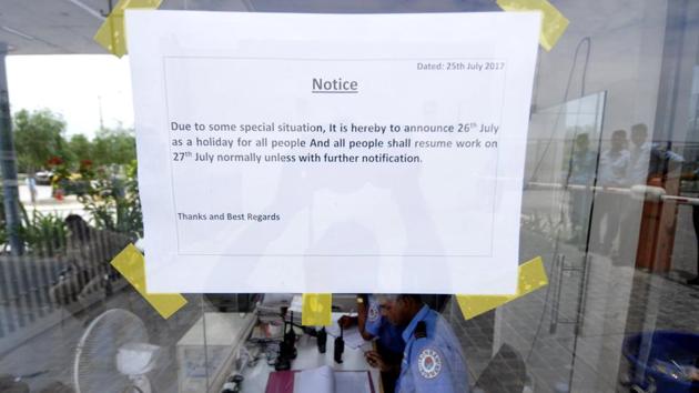 Police personnel were deployed at Vivo factory in Greater Noida to avoid violence by sacked workers. (Sunil Ghosh/HT Photo) Police personnel were deployed at Vivo factory in Greater Noida to avoid violence by sacked workers. (Sunil Ghosh/HT Photo)
