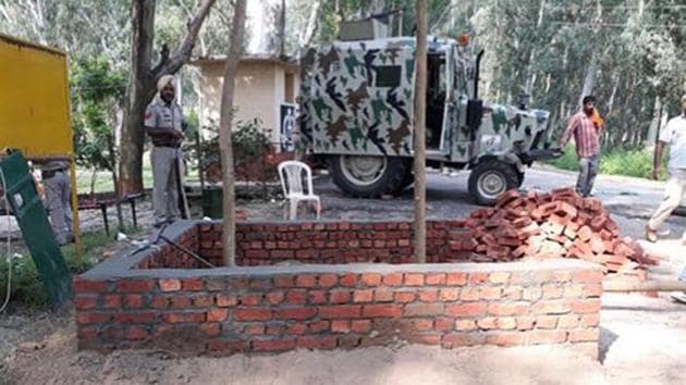 The ‘permanent morchas’ are being built to ensure that the Punjab police personnel stay alert regarding any movement near border villages or roads leading to the fence.(HT Photo)