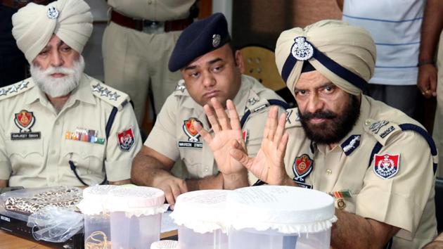 Bathinda Zone IGP MS Chinna (right) during a press conference on Tuesday .(Sanjeev Kumar/HT)