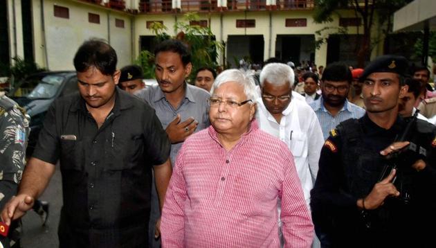 RJD supremo Lalu Prasad Yadav arrives to appear at a special CBI court in Ranchi on Thursday in connection with the multi-crore fodder scam case. (PTI Photo) RJD supremo Lalu Prasad Yadav arrives to appear at a special CBI court in Ranchi on Thursday in connection with the multi-crore fodder scam case. (PTI Photo)