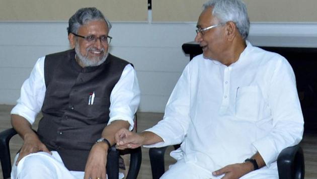 Bihar chief minister Nitish Kumar with senior BJP leader Sushil Kumar Modi at a meeting in Patna on Wednesday.(PTI) Bihar chief minister Nitish Kumar with senior BJP leader Sushil Kumar Modi at a meeting in Patna on Wednesday.(PTI)