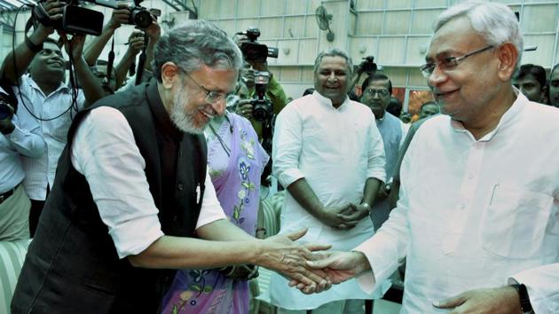 Senior BJP leader Sushil Kumar Modi greets Nitish Kumar after the oath-taking ceremony at Raj Bhawan in Patna on Thursday. (PTI Photo) Senior BJP leader Sushil Kumar Modi greets Nitish Kumar after the oath-taking ceremony at Raj Bhawan in Patna on Thursday. (PTI Photo)