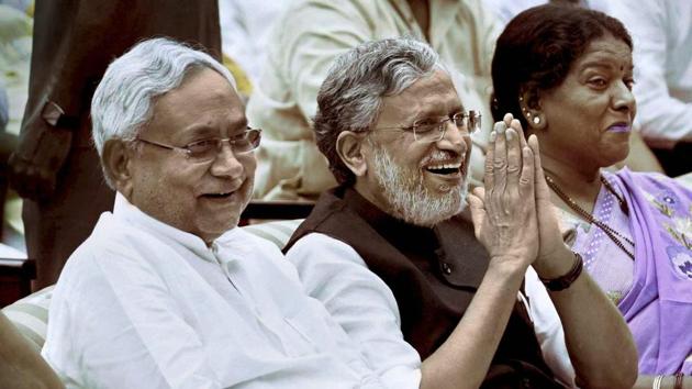 Nitish Kumar with senior BJP leader Sushil Kumar Modi at an oath taking ceremony, at Raj Bhawan in Patna on Thursday. (PTI) Nitish Kumar with senior BJP leader Sushil Kumar Modi at an oath taking ceremony, at Raj Bhawan in Patna on Thursday. (PTI)