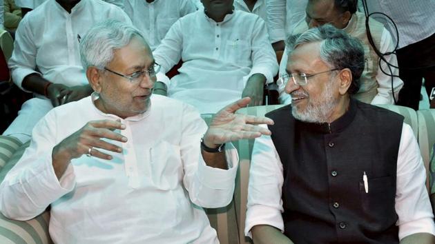 Nitish Kumar with senior BJP leader Sushil Kumar Modi at an oath taking ceremony at Raj Bhawan in Patna on Thursday. (PTI Photo) Nitish Kumar with senior BJP leader Sushil Kumar Modi at an oath taking ceremony at Raj Bhawan in Patna on Thursday. (PTI Photo)