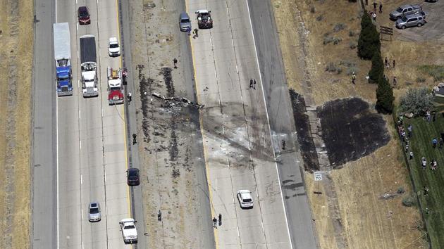 A small plane crashed after it took off from a nearby municipal airport on Interstate 15 in Riverdale, Utah, about 35 miles north of Salt Lake City, on July 26.(AP Photo)
