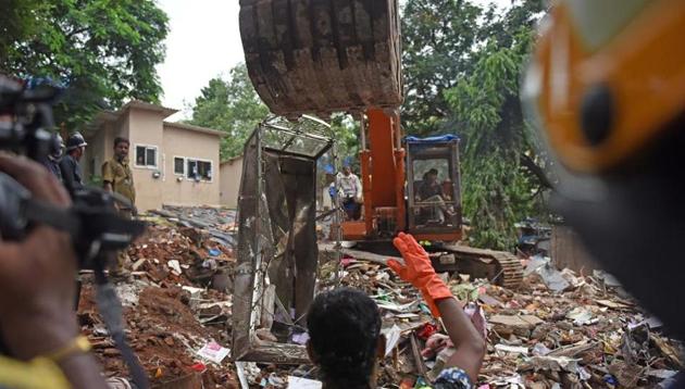 The rescue work in progress on Wednesday. (Satyabrata Tripathy/HT Photo) The rescue work in progress on Wednesday. (Satyabrata Tripathy/HT Photo)