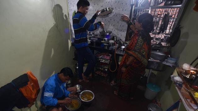 Akshay’s day begins early morning when he leaves the one-room house, that he shares with his brothers Tushar and Vishal, and parents, in the Dandekar Bridge slum area, and reaches the newspaper distribution hub at Appa Balwant Chowk, four kilometres away, to pick up his bundles. (Pratham Gokhale/HT PHOTO) Akshay’s day begins early morning when he leaves the one-room house, that he shares with his brothers Tushar and Vishal, and parents, in the Dandekar Bridge slum area, and reaches the newspaper distribution hub at Appa Balwant Chowk, four kilometres away, to pick up his bundles. (Pratham Gokhale/HT PHOTO)