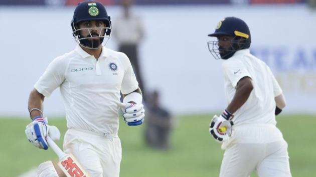 Indian cricket team captain Virat Kohli (L) and Abhinav Mukund combined well to put on 133 runs for the third wicket. (AFP) Indian cricket team captain Virat Kohli (L) and Abhinav Mukund combined well to put on 133 runs for the third wicket. (AFP)