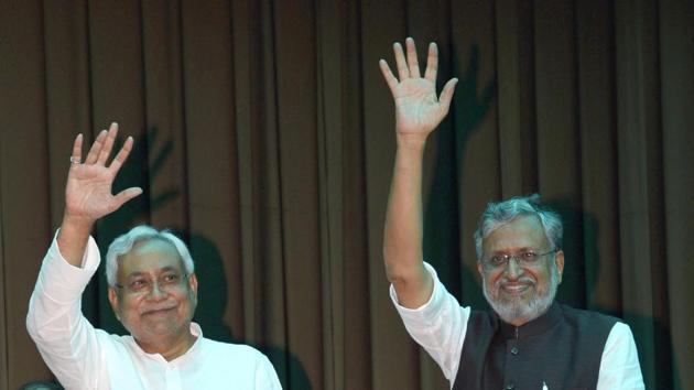 Bihar chief minister Nitish Kumar and BJP leader Shushil Modi at Raj Bhavan in Patna on Thursday. (Santosh Kumar/HT Photo) Bihar chief minister Nitish Kumar and BJP leader Shushil Modi at Raj Bhavan in Patna on Thursday. (Santosh Kumar/HT Photo)