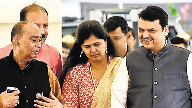 Maharashtra chief minister Devendra Fadnavis and rural development minister Pankaja Munde arrive at Vidhan Bhavan on Day 4 of the monsoon session on Thursday. (Kunal Patil/HT Photo) Maharashtra chief minister Devendra Fadnavis and rural development minister Pankaja Munde arrive at Vidhan Bhavan on Day 4 of the monsoon session on Thursday. (Kunal Patil/HT Photo)