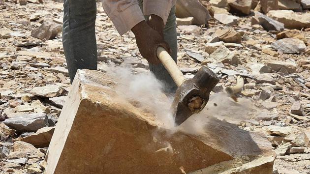 A majority of mines operate using dry mining that generates a large amount of residual dust. This is compounded by a lack of protective gear for miners exposing them to inhalation of fine silica particles. A shift towards wet mining which reduces the amount of dust is a relatively cost efficient means of curbing the hazard of silicosis --so far a disease with no known cure. (Raj K Raj / HT Photo)