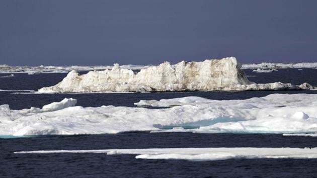 Sea ice floats past the Finnish icebreaker MSV Nordica as the ship sails through the Chukchi Sea off the coast of Alaska while traversing the Arctic's Northwest Passage. (David Goldman / AP)