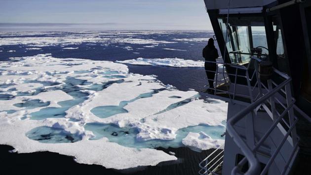 MSV Nordica sails through ice floating on the Chukchi Sea off the coast of Alaska while traversing the Arctic's Northwest Passage, a treacherous, ice-bound route where Norwegian explorer Roald Amundsen made the first successful transit in 1906. (David Goldman / AP)