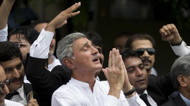 Senior opposition politician Jehangir Tareen celebrates the dismissal of Pakistani Prime Minister Nawaz Sharif outside the Supreme Court in Islamabad. Ruling party PML-N members however say Sharif’s days are not over. ‘This is a difficult time for the PML-N. But the power to make party decisions will remain with Nawaz Sharif’, the Dawn quoted Punjab province Law Minister Rana Sanaullah as saying. (B. K. Bangash / AP) Senior opposition politician Jehangir Tareen celebrates the dismissal of Pakistani Prime Minister Nawaz Sharif outside the Supreme Court in Islamabad. Ruling party PML-N members however say Sharif’s days are not over. ‘This is a difficult time for the PML-N. But the power to make party decisions will remain with Nawaz Sharif’, the Dawn quoted Punjab province Law Minister Rana Sanaullah as saying. (B. K. Bangash / AP)