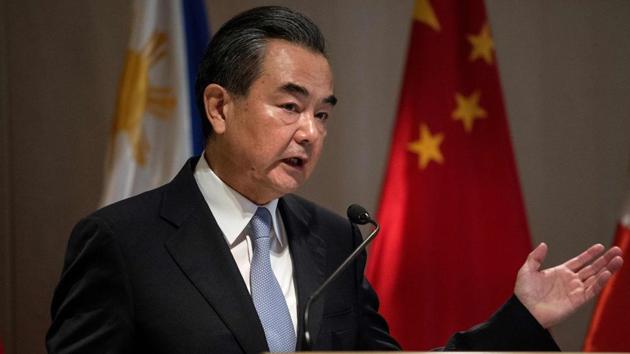 China's Foreign Minister Wang Yi gestures during a joint press conference with Philippine Foreign Affairs secretary Alan Peter Cayetano in Manila on July 25, 2017. (AFP) China's Foreign Minister Wang Yi gestures during a joint press conference with Philippine Foreign Affairs secretary Alan Peter Cayetano in Manila on July 25, 2017. (AFP)