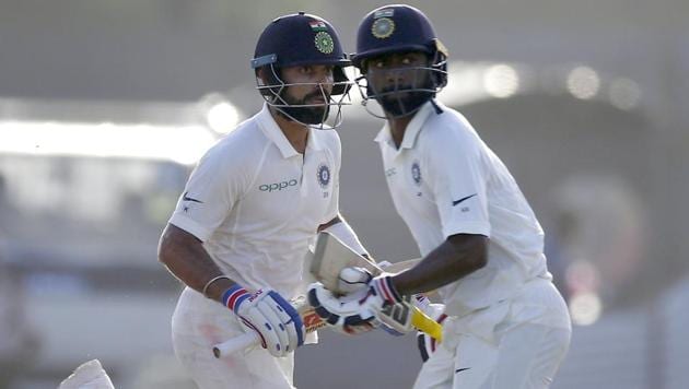 India captain Virat Kohli (L) and Abhinav Mukund extented their lead against Sri Lanka on the third day of the first Test in Galle. (AP) India captain Virat Kohli (L) and Abhinav Mukund extented their lead against Sri Lanka on the third day of the first Test in Galle. (AP)