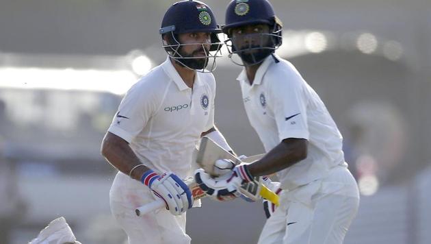Virat Kohli and Abhinav Mukund put on a 133-run stand as India finished the Day 3 of the Galle Test against Sri Lanka with a lead of 498. (AP) Virat Kohli and Abhinav Mukund put on a 133-run stand as India finished the Day 3 of the Galle Test against Sri Lanka with a lead of 498. (AP)