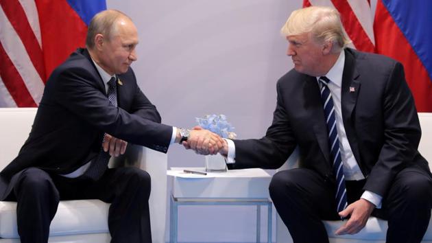 US President Donald Trump shakes hands with Russia's President Vladimir Putin during their bilateral meeting at the G20 summit in Hamburg, Germany July 7. (Reuters File Photo) US President Donald Trump shakes hands with Russia's President Vladimir Putin during their bilateral meeting at the G20 summit in Hamburg, Germany July 7. (Reuters File Photo)