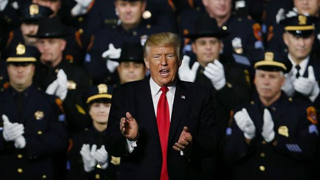 President Donald Trump speaks at Suffolk Community College on July 28, 2017 in Brentwood, New York. Trump, speaking close to where the violent street gang MS-13 has committed a number of murders, urged Congress to dedicate more funding to border enforcement and faster deportations. Trump spoke to an audience that included to law enforcement officers and the family members of crime victims. (AFP) President Donald Trump speaks at Suffolk Community College on July 28, 2017 in Brentwood, New York. Trump, speaking close to where the violent street gang MS-13 has committed a number of murders, urged Congress to dedicate more funding to border enforcement and faster deportations. Trump spoke to an audience that included to law enforcement officers and the family members of crime victims. (AFP)