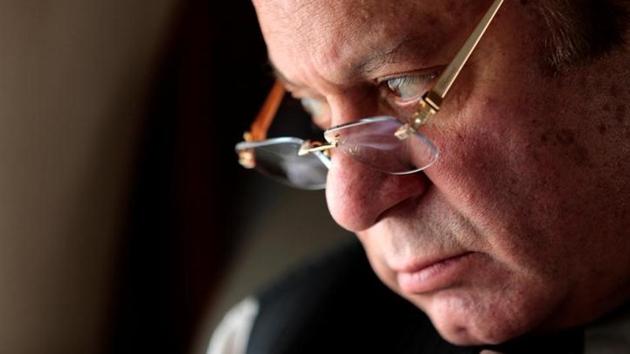 Pakistani Prime Minister Nawaz Sharif looks out the window of his plane after attending a ceremony to inaugurate the M9 motorway between Karachi and Hyderabad, Pakistan. (Reuters) Pakistani Prime Minister Nawaz Sharif looks out the window of his plane after attending a ceremony to inaugurate the M9 motorway between Karachi and Hyderabad, Pakistan. (Reuters)