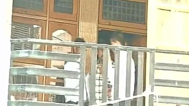 NIA officials at Devinder Singh Behl’s residence. (ANI Photo) NIA officials at Devinder Singh Behl’s residence. (ANI Photo)