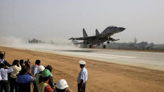 An Indian Air Force (IAF) fighter jet practices landing on the Agra-Lucknow highway in Unnao on Friday. (PTI File Photo) An Indian Air Force (IAF) fighter jet practices landing on the Agra-Lucknow highway in Unnao on Friday. (PTI File Photo)