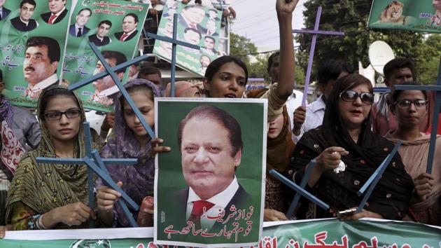 Supporters of Pakistan's deposed Prime Minister Nawaz Sharif chant slogans at a rally to condemn the dismissal of their leader. (AP) Supporters of Pakistan's deposed Prime Minister Nawaz Sharif chant slogans at a rally to condemn the dismissal of their leader. (AP)