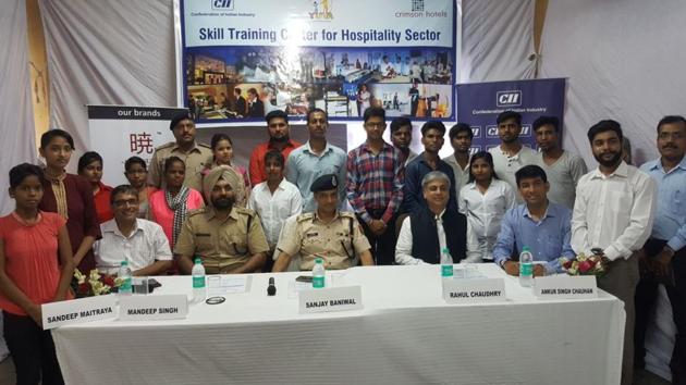 Officials of Delhi Police and Confederation of Indian Industry (CII) pose for a group photograph with the youngsters they have enrolled under Project Yuva. (Aditya Dogra/HT Photo) Officials of Delhi Police and Confederation of Indian Industry (CII) pose for a group photograph with the youngsters they have enrolled under Project Yuva. (Aditya Dogra/HT Photo)