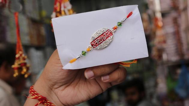 The Swachh Bharat rakhis, inspired by the Swachh Bharat Abhiyan, have both uniqueness and a good message.(HTPHOTO/MANOJ VERMA)