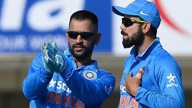 Ravi Shastri believes the way Virat Kohli is progressing as Indian cricket team’s captain, he may well catch up with MS Dhoni.(AFP)