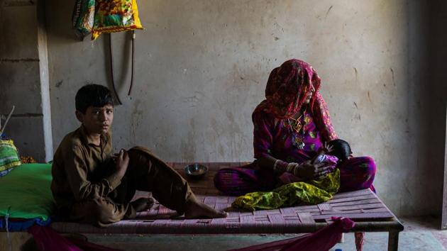 Pakistani migrant worker Meera (right) in an unauthorised settlement for Pakistani Hindus in Jodhpur. (AFP Photo) Pakistani migrant worker Meera (right) in an unauthorised settlement for Pakistani Hindus in Jodhpur. (AFP Photo)
