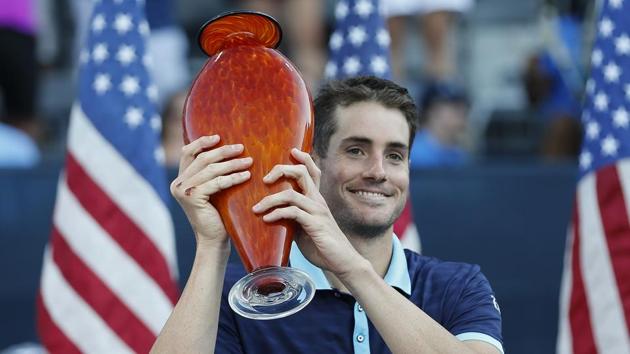 John Isner poses with the trophy after defeating Ryan Harrison in the finals of the ATP Atlanta Open. (AP) John Isner poses with the trophy after defeating Ryan Harrison in the finals of the ATP Atlanta Open. (AP)