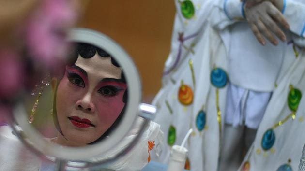 With the rise of the Qing in the 18th century, the city of Guangzhou welcomed an inundation of opera troupes from provinces to the north. These opera troupes were seen as more cultivated, and were patronized by an elite segment of Guangdong society. (MANAN VATSYAYANA / AFP) With the rise of the Qing in the 18th century, the city of Guangzhou welcomed an inundation of opera troupes from provinces to the north. These opera troupes were seen as more cultivated, and were patronized by an elite segment of Guangdong society. (MANAN VATSYAYANA / AFP)
