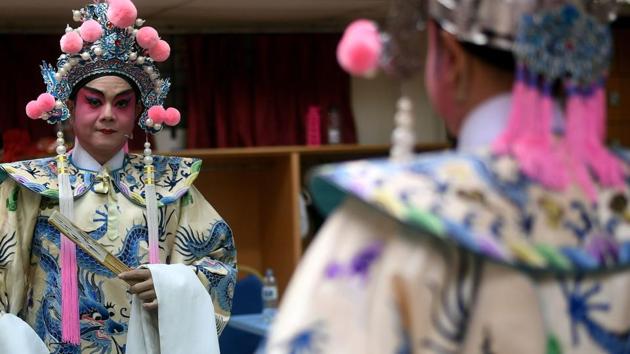 However, by the end of the 1930s, the turmoil caused by the Second Sino-Japanese War and the subsequent market collapse propelled the decline of Cantonese opera. (MANAN VATSYAYANA / AFP) However, by the end of the 1930s, the turmoil caused by the Second Sino-Japanese War and the subsequent market collapse propelled the decline of Cantonese opera. (MANAN VATSYAYANA / AFP)
