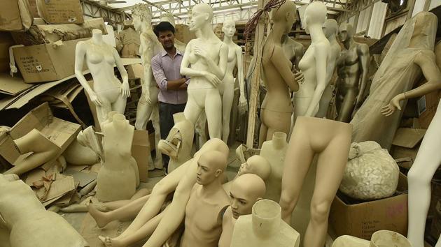 The familiar sight of mannequins poised confidently at storefronts is only the final leg in the journey these silent, lifelike models make. Stepping into one of several businesses that manufacture them one finds mannequins in all stages of creation - limbless, disjointed, naked and awaiting purpose. (Raj K Raj / HT Photo) The familiar sight of mannequins poised confidently at storefronts is only the final leg in the journey these silent, lifelike models make. Stepping into one of several businesses that manufacture them one finds mannequins in all stages of creation - limbless, disjointed, naked and awaiting purpose. (Raj K Raj / HT Photo)