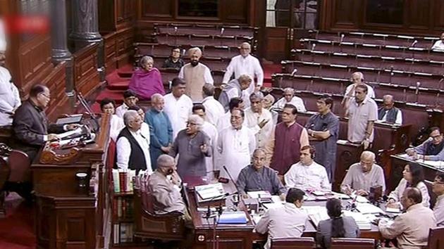 Opposition members protest in Rajya Sabha on Monday. The Opposition forced an amendment in a bill to accord constitutional status to the reconstituted National Commission for Backward Classes. (PTI Photo / TV grab)(PTI) Opposition members protest in Rajya Sabha on Monday. The Opposition forced an amendment in a bill to accord constitutional status to the reconstituted National Commission for Backward Classes. (PTI Photo / TV grab)(PTI)