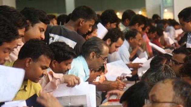 People submitting their Income tax return form at Pragati Maidan in New Delhi. (HT File Photo)