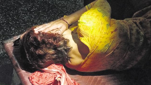 A woman whose hair was reportedly chopped off on Sunday night.(Shiv Sunny / HTPhoto)