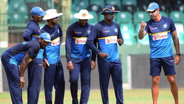 Sri Lankan cricket coach Nic Pothas instructs players during a practice session at the Sinhalease Sports Club (SSC) Ground in Colombo. (AFP)