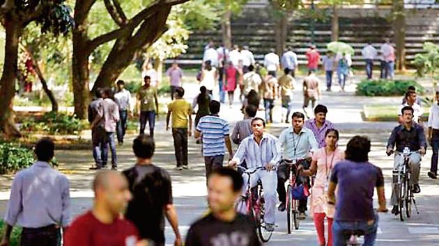 Infosys employees move through the headquarters in Bangalore.(AP File Photo)