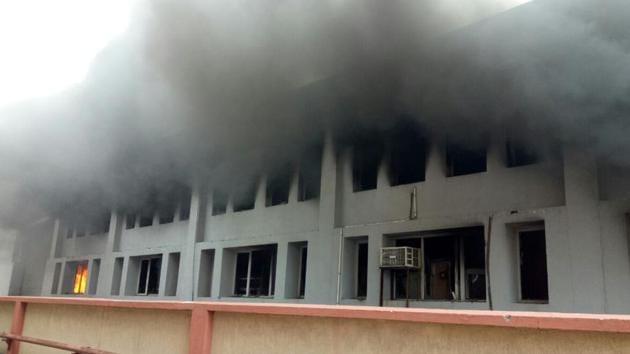 The blaze at the factory of Avon Biwheeler Accessories Pvt Ltd started around 8.30am on Tuesday and nine fire tenders doused the flames by 12.30pm.(HT Photo)