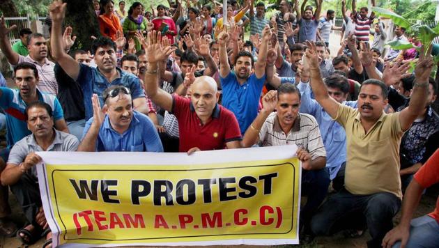 Jammu: Members of Kashmiri Migrant Employees working in Kashmir Valley staged a massive protest against the administration seeking guarantee of security for migrant employees, in Jammu on July 24, 2017. (PTI) Jammu: Members of Kashmiri Migrant Employees working in Kashmir Valley staged a massive protest against the administration seeking guarantee of security for migrant employees, in Jammu on July 24, 2017. (PTI)